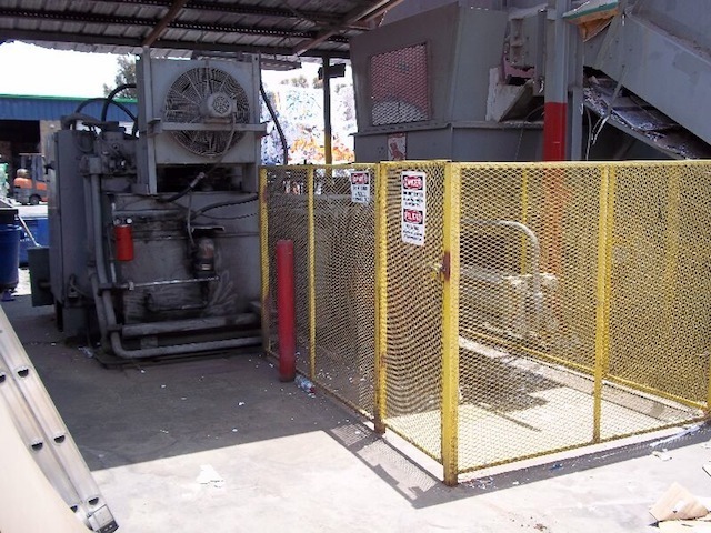 Logemann #245A-1, 2-ram hydraulic baler with conveyor, 100 HP, 70" x 120" feed opening - Image 1