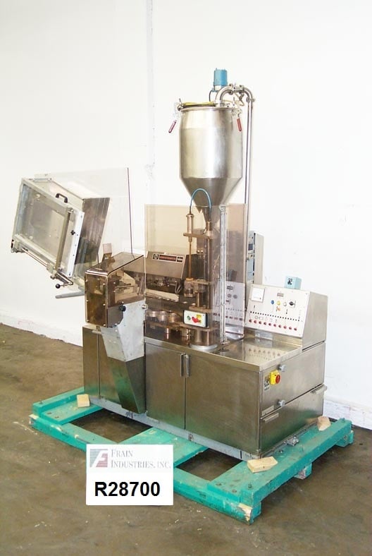 Norden #AM1000, automatic, Stainless Steel, metal tube filler & sealer, 20-100 tubes/minute, bottom up fill - Image 1