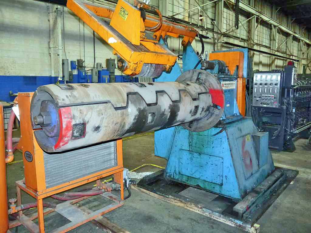 20000 lb. Progressive, 72" wide, 20"-24" ID, slide base, 72" face mandrel, WC brake, 1994 - Image 1