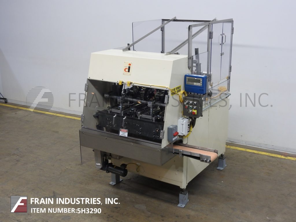 Delkor #752, automatic, dual head top load tray former with hot melt glue sealer, 5-60 cycles per minute each - Image 1