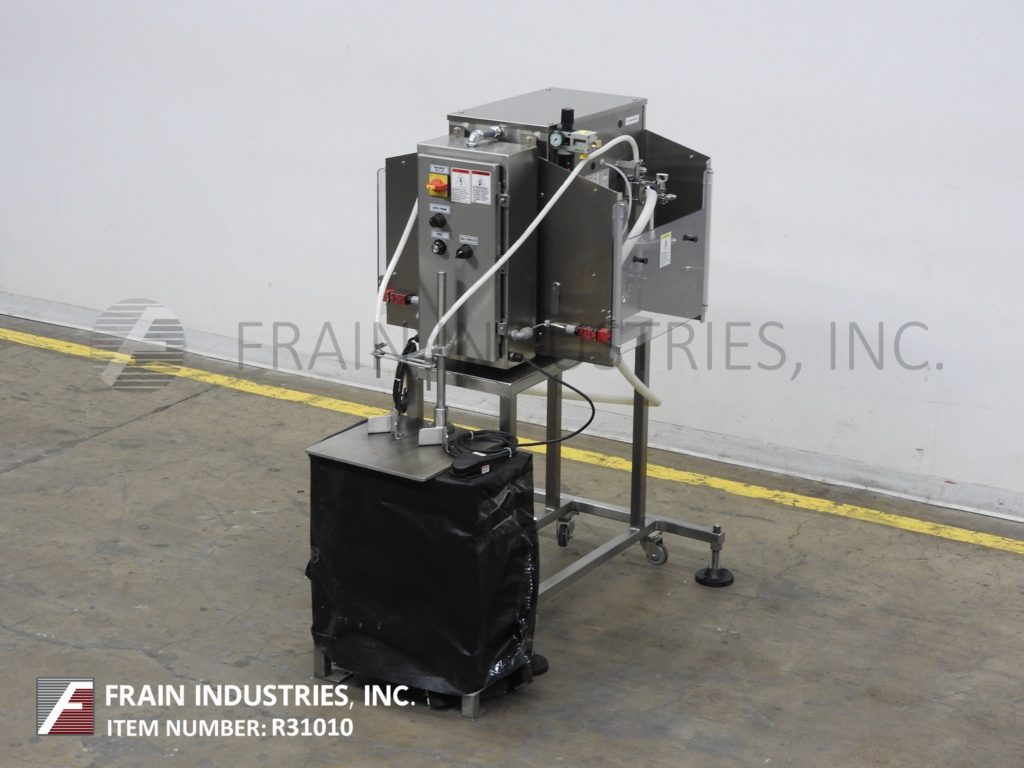 Filamatic #DAB-32-2, semi-automatic 2-head table top piston filler, 1ml to 1100ml fill range, (2) 550cc - Image 1