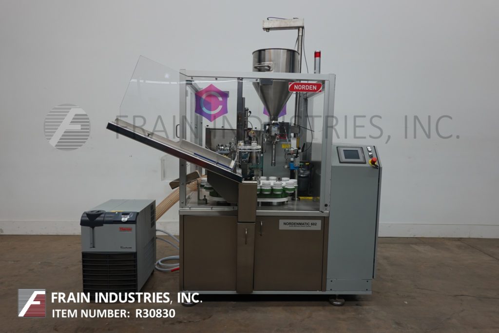 Norden #602, automatic, hot air, plastic or laminate tube filler & sealer, 10-60 tubes per minute, 18 pocket - Image 1