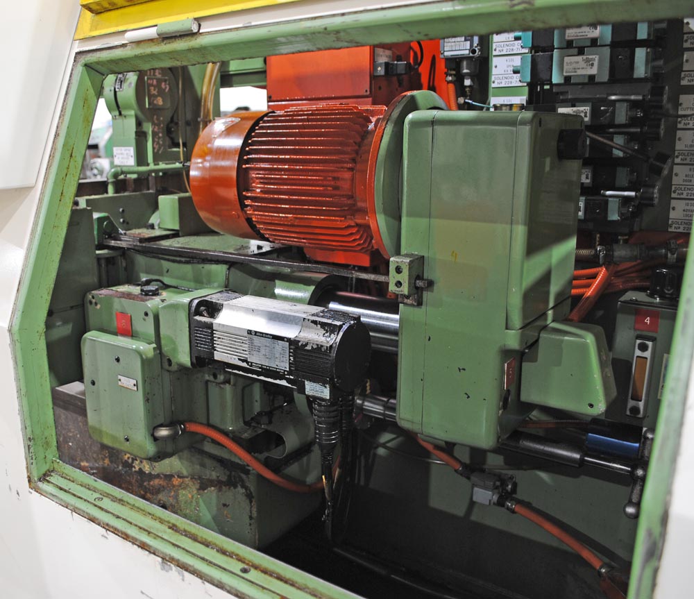 8" x 27" Hey #3, CNC facing & centering machine, 2-air vises, chip conveyor, AB Control, 1999 - Image 4