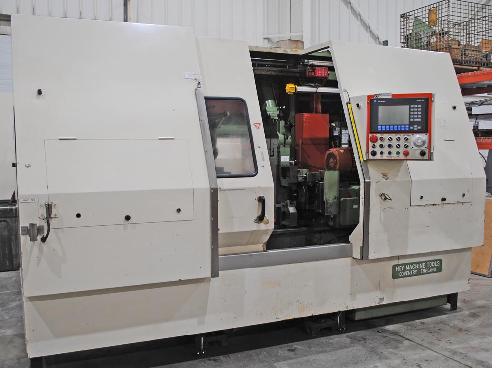 8" x 27" Hey #3, CNC facing & centering machine, 2-air vises, chip conveyor, AB Control, 1999 - Image 5