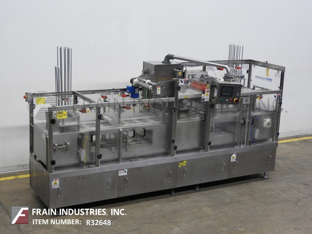Orics #2-lane, inline, Stainless Steel, cup / tray denster, filler, roll stock film, heat sealer and over - Image 1
