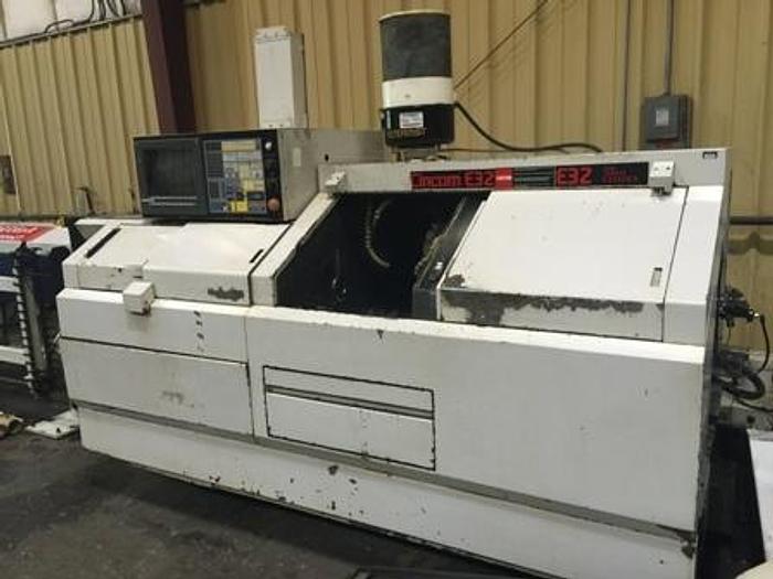 Citizen #E32, CNC screw machine, chip conveyor, live Tools