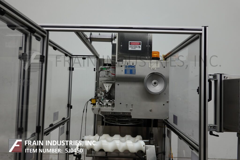 PDC #75-ERL, automatic electronic regis, tamper evident neck bander, 50-225 CPM, mounted on 4 leg frame with - Image 2