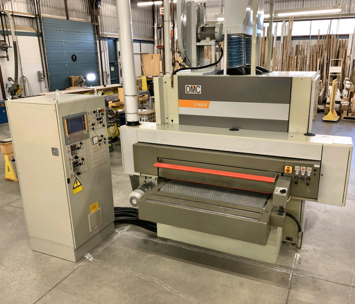 51" Dmc #Unisand-135-3, 3-Head Wide Belt, 4" part thickness, 82 FPM feed, 52" x 103" abrasive belt, 1996 - Image 1