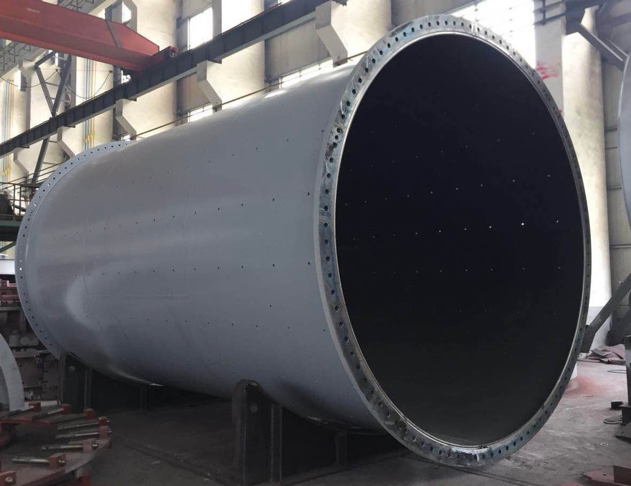 10.5' x 18.5' Outotec Ball mill with 1000 HP, cast mill heads, unused surplus (2 available) - Image 3