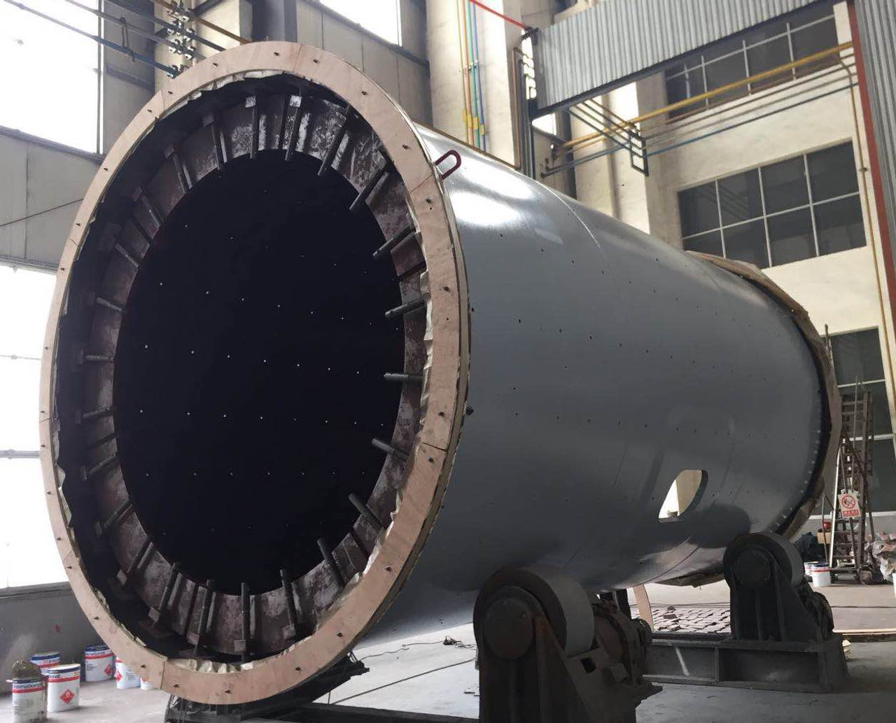 10.5' x 18.5' Outotec Ball mill with 1000 HP, cast mill heads, unused surplus (2 available) - Image 4
