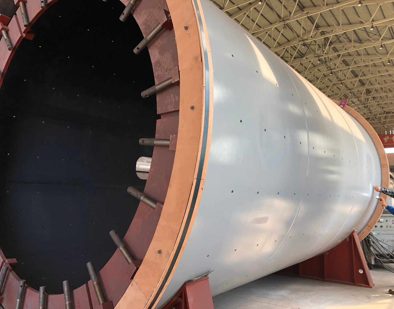 10.5' x 18.5' Outotec Ball mill with 1000 HP, cast mill heads, unused surplus (2 available) - Image 6