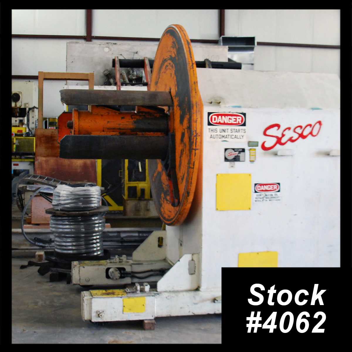 30000 lb. Sesco #55-536, coil reel & car, 36" width, 72" outside dimensions, 24" ID, 3-arm hydraulic - Image 1