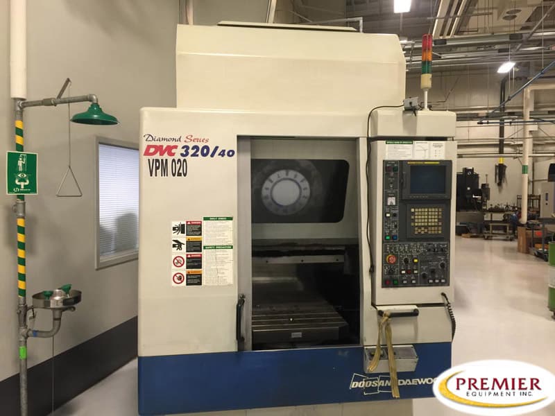 Daewoo Doosan #DVC-320/40, CNC drill & tap, Fanuc 21iM, 20.4" X, 12.6" Y, 12.6" Z, 12000 RPM, 14 automatic - Image 1
