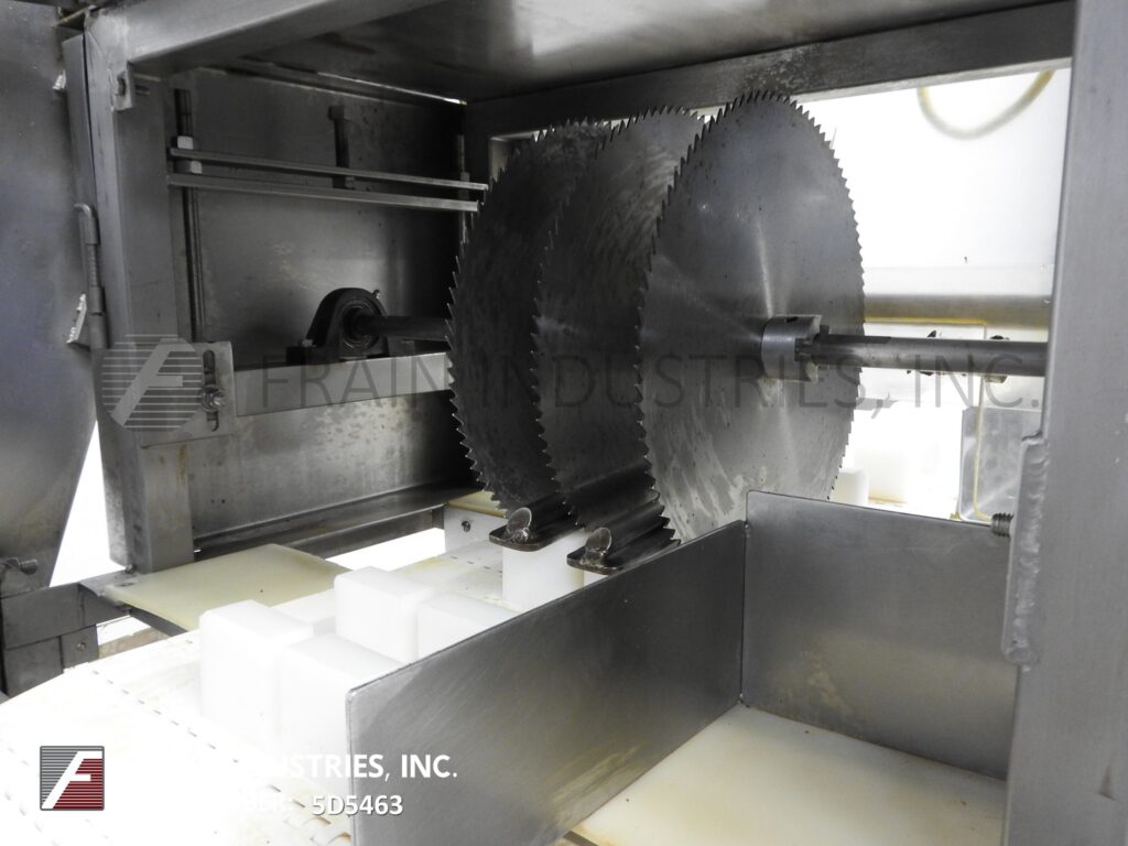 Multi-slicer with (3) 12" blades slicing product in segments - Image 2