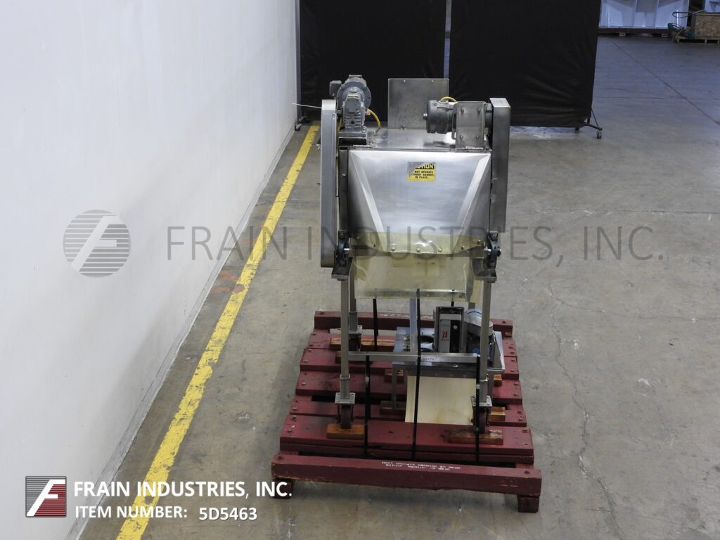 Multi-slicer with (3) 12" blades slicing product in segments - Image 3
