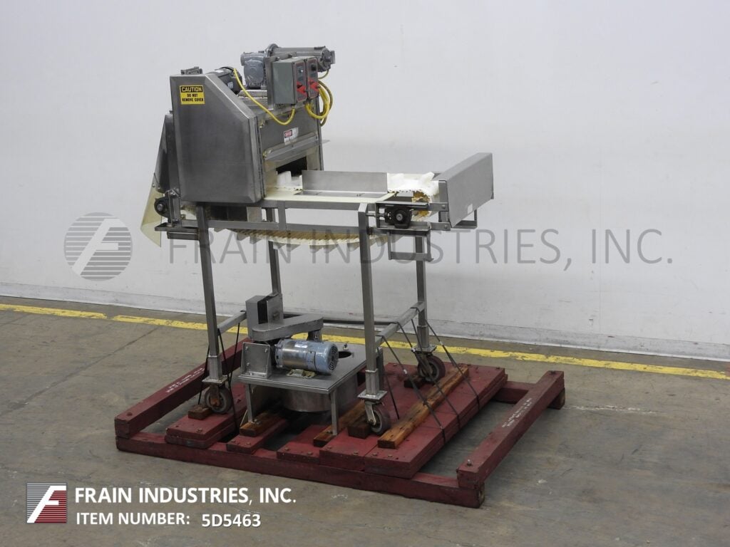 Multi-slicer with (3) 12" blades slicing product in segments - Image 5