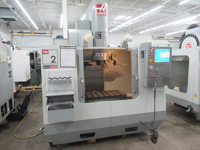 Haas #VM-2, CNC vertical machining center w/4th Axis drive, chip auger, coolant system, rigid tapping - Image 1