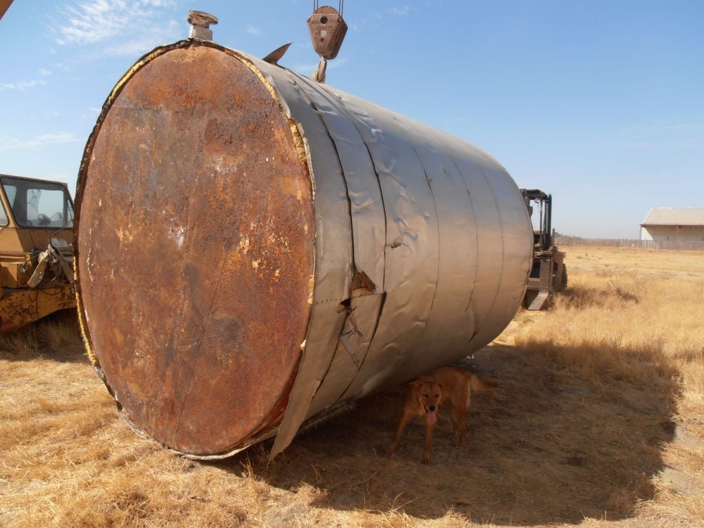 6000 gallon Carbon Steel Storage Tank, Epoxy, Jkt, 9'10" diameter x 12' high, 3" diameter side bottom outlet - Image 3