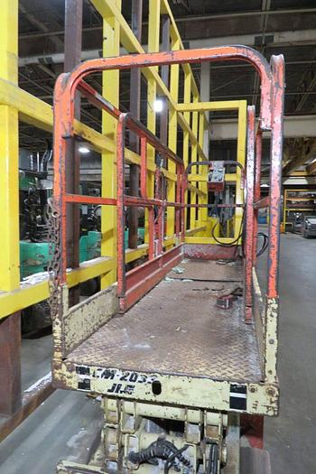 750 lb. JLG #CM-2033, electric scissor lift, 20' platform hght, 20