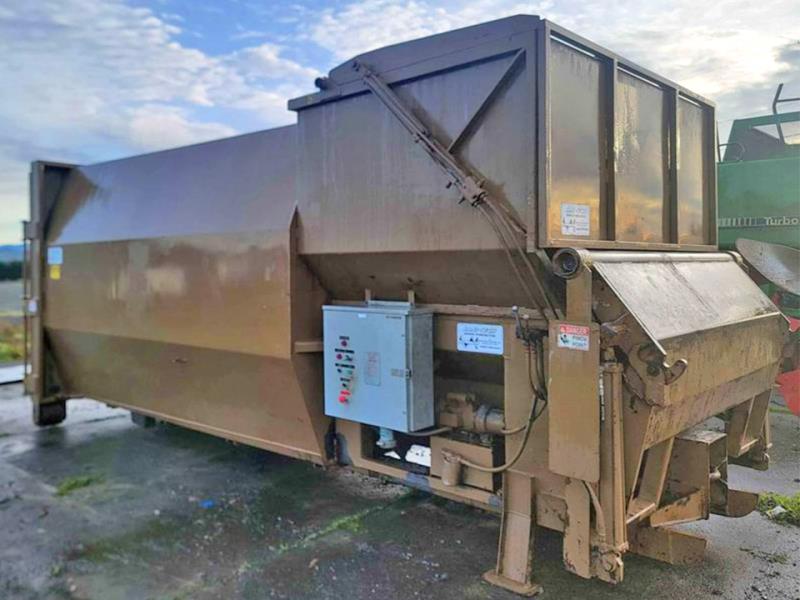 Sani-Tech #ST1546-36, auger feed compactor, 4.3 cu.yd., 10 HP motor, 1999 - Image 1