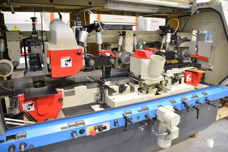 Weinig #U-23E, feed through moulder, 6-heads, 9-1/16" x 4-3/4" capacity, 1-9/16" spindle, variable speed, 2005 - Image 6