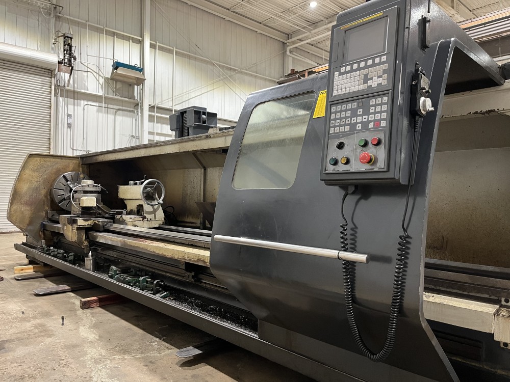 Vanguard #CAK80485D, 2-Axis flat bed CNC lathe, Fanuc Oi Mate, 4-jaw 25" chuck, 32" swing, 191" centers, 4.1" - Image 1