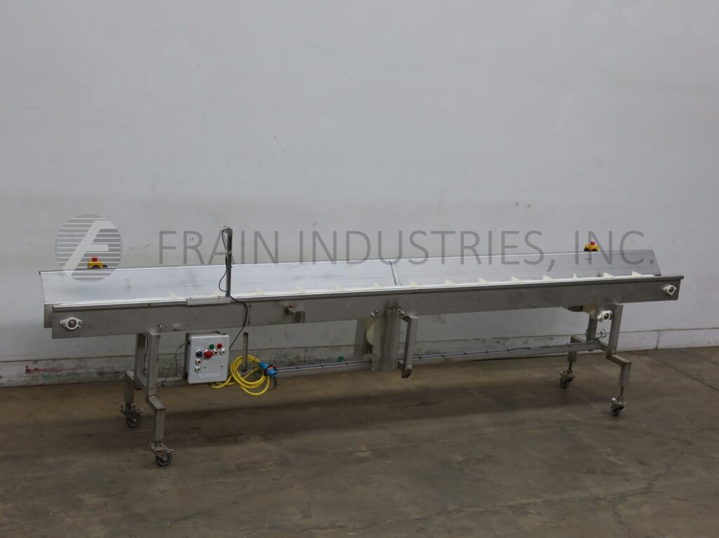 7-1/2" wide x 15.3' long, Stainless Steel table top conveyor, mounted on frame with locking casters - Image 1