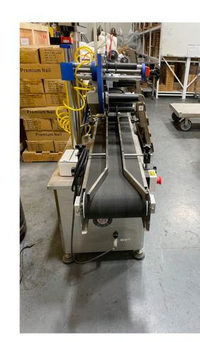 Model TT-LB, wipe-on labeler with horizontal pass thru belt conveyor through labeling station - Image 2