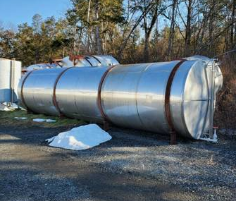 5800 gallon 304 Stainless Steel Horizontal Tank on legs, 82" H x 300" L, 2.5" fitting size - Image 1