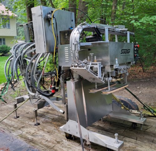 SureKap #12-Head, Bottle Filling Line, Piston Filler, 1500 Gal. Mixing Tank w/ Pump - Image 1