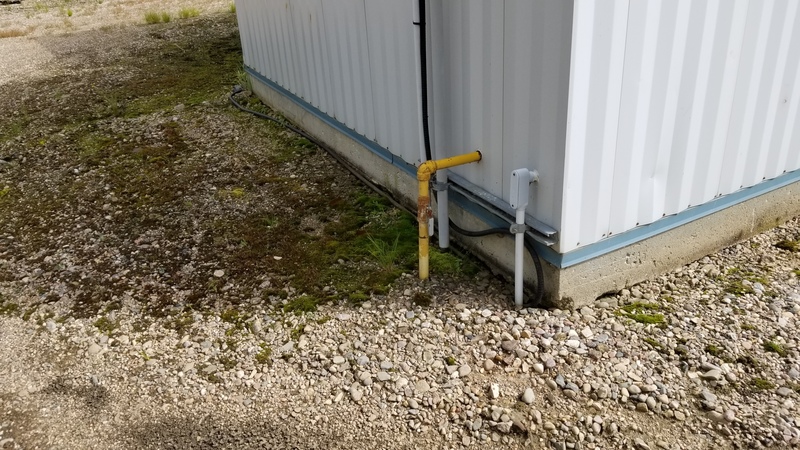 32' Kearney & Trecker Metal Industries, steel/concrete storage building, assembled on concrete pad, 2002 - Image 4