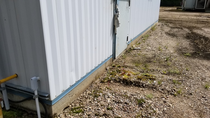 32' Kearney & Trecker Metal Industries, steel/concrete storage building, assembled on concrete pad, 2002 - Image 5