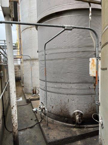 10000 gallon Northland Stainless Steel tank, 96" dia. x 312" straight side, flat sloped bottom 1981 - Image 4