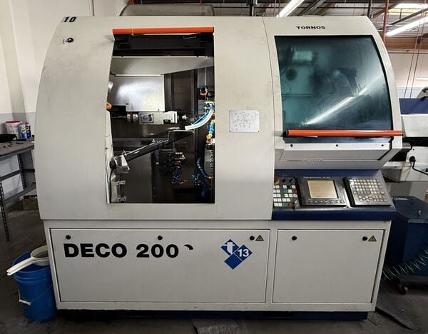 Tornos #Deco-2000/13, CNC automatic screw machine, 9-Axis, 12' bar feed, 2001 - Image 1
