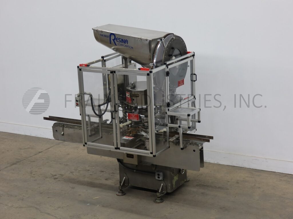 Resina #S30, automatic single head chuck capper, capacity hopper with disc pin sorter, capacity chute - Image 1