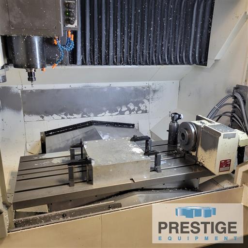 Okuma #Genos-M560-V, 41" X, 22" Y, OSP-300M, 32 automatic tool changer, part/tool probe, 4th Axis table, Chip - Image 2