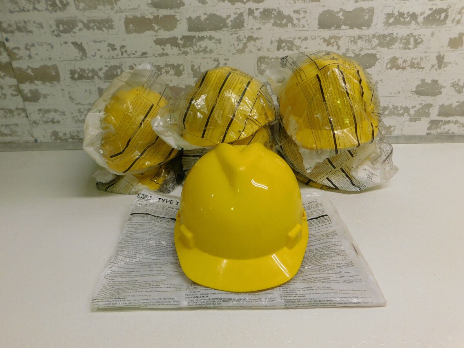MSA, 463944, V-Gard Slotted Hard Hat w/Staz-On Suspension, Yellow, 9 Qty., New - Image 1