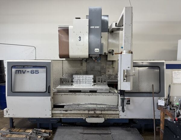 Mori Seiki #MV-65/50, CNC vertical machining center, MF-M6 Control, 65" X, 25" Y, 25" Z, 5000 RPM, #50 taper - Image 1
