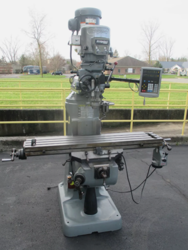 Bridgeport, vertical mill, 9" x48" table, 2/3 HP, Newall digital read out, Servo feed, Kurt vise - Image 1