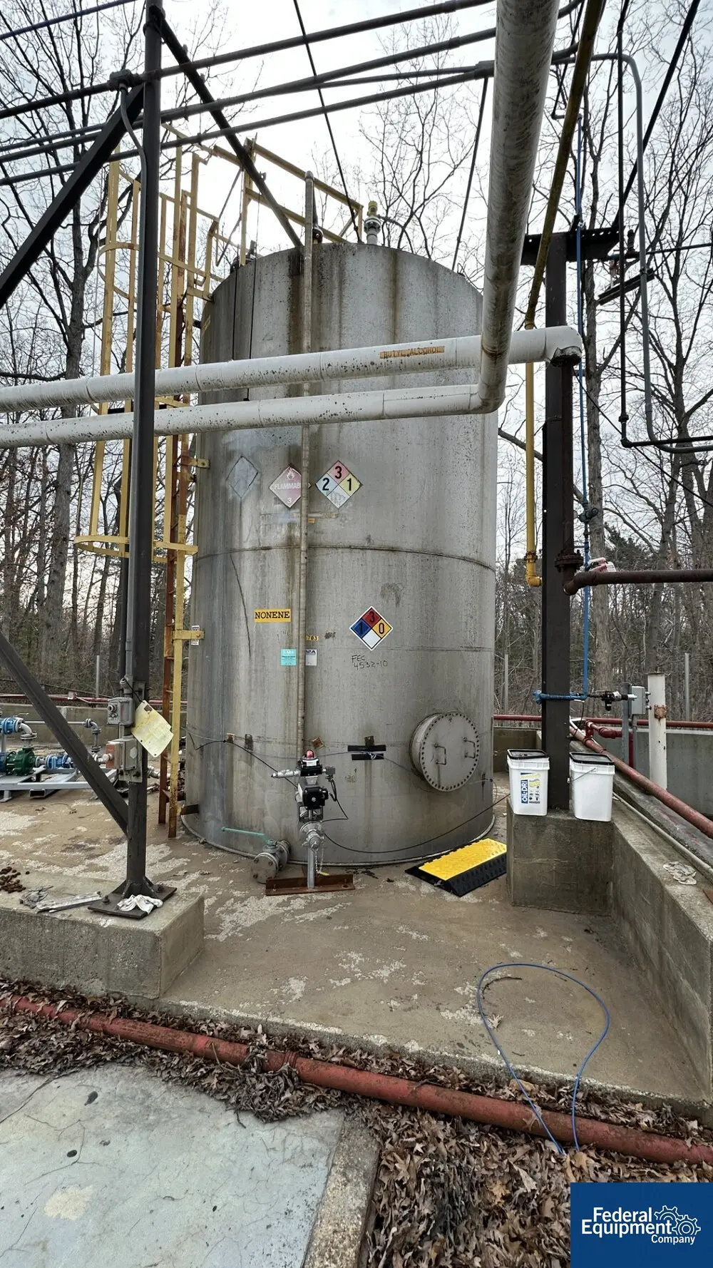 10000 gallon McDaniel MFG, Stainless Steel Storage Tank, 10' 6" diameter x 16' straight side, cone top, flat - Image 1