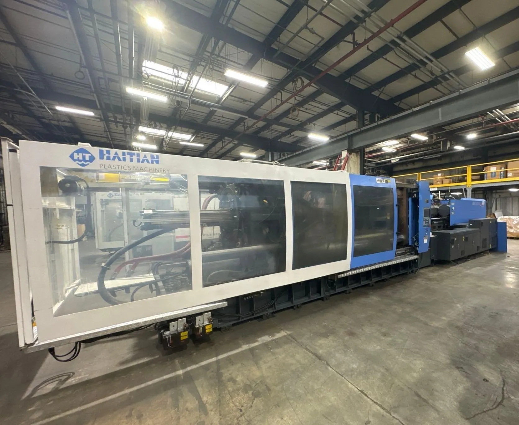 1124 Ton, 155 oz., Haitian #MA-10000/8400, horizontal injection molding machine, 45.67" x 45.67" tie bar - Image 1