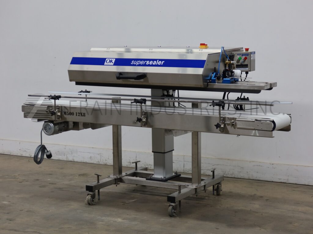 OK Ok International #SB40, automatic, in line, band style bag sealer, 0-840 inches per minute - Image 1