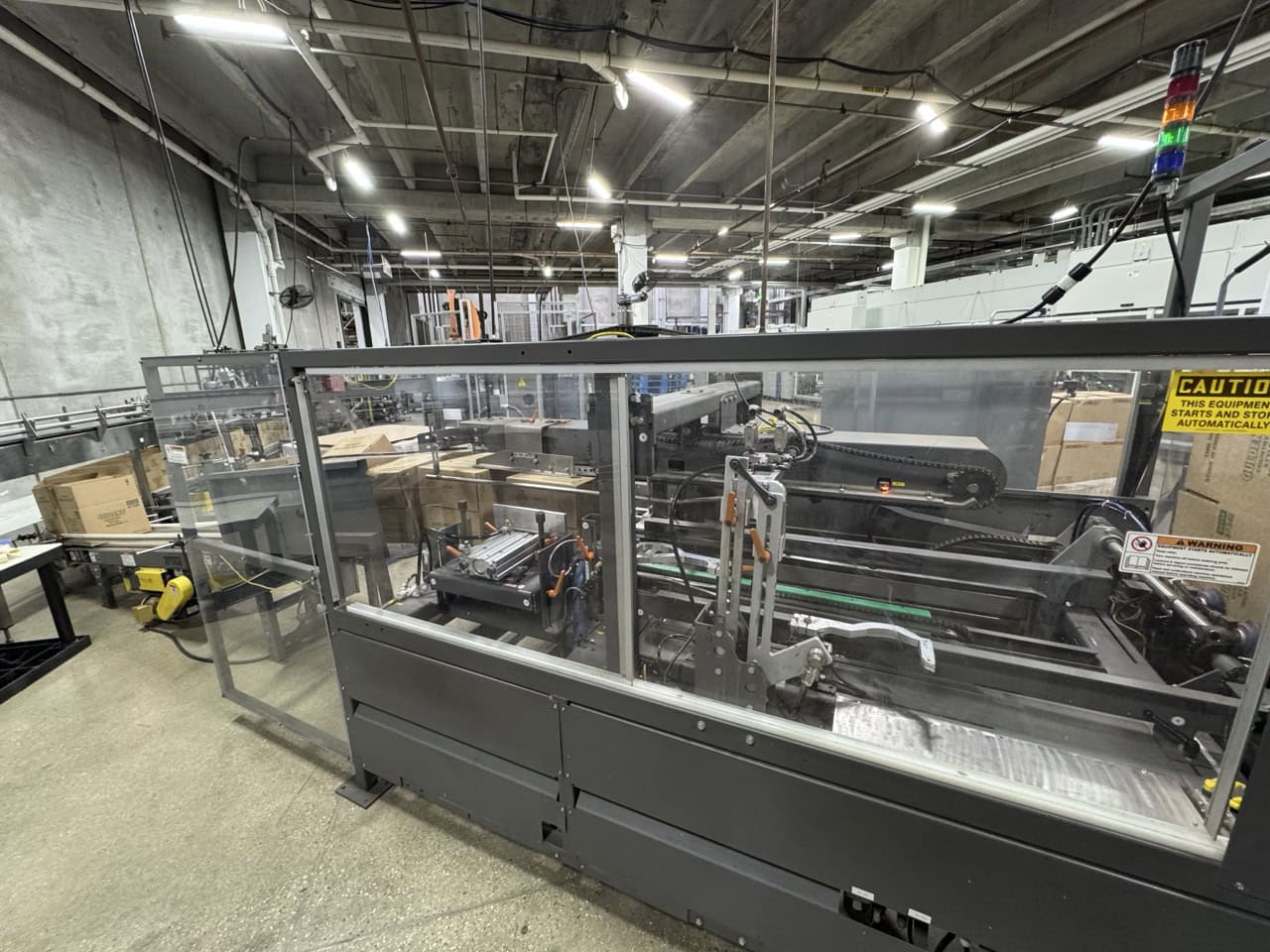 Pearson Packaging Systems, complete packaging system, made up of box erector, robot, palletizer & unscrambler - Image 2