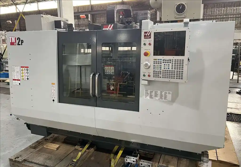 Haas #TM-2P, 40" X, 16" Y, 16" Z, 10000 RPM, 20 automatic tool changer, automatic air gun, chip auger, rigid - Image 1