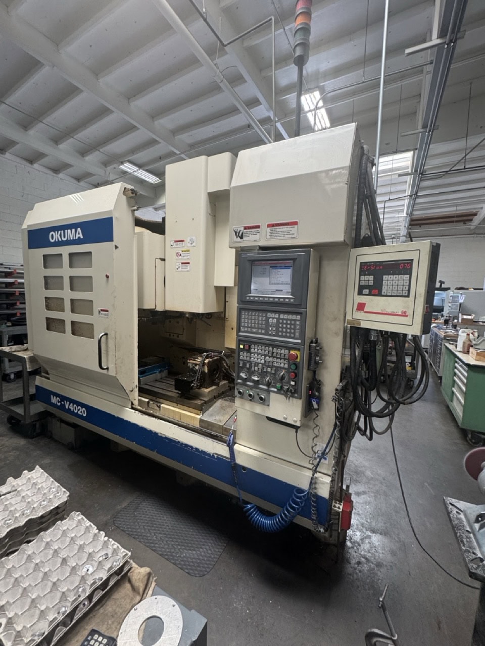 Okuma #MC-V4020, vertical machining center, 40" X, 20" Y, 17.7" Z, 8000 RPM, 20 automatic tool changer, #40 - Image 1