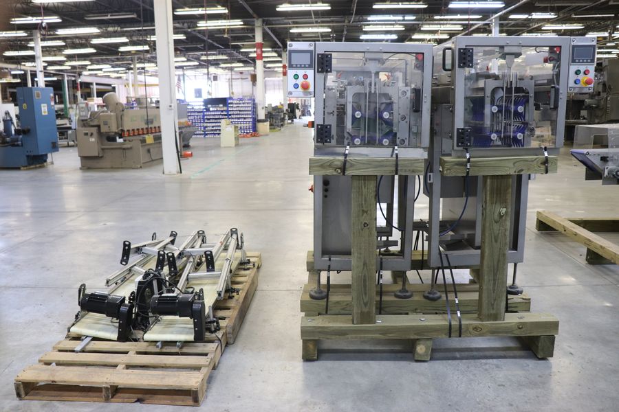 Case loading system, Syntegon #CLS, 12" chute length, 9-7/16" belt width, 2022 - Image 1