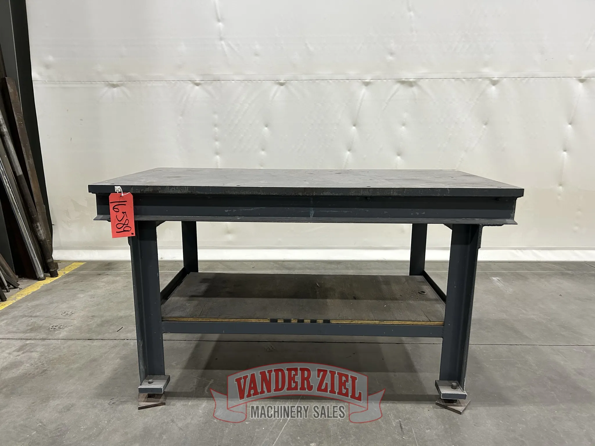 5.5' L x 2' width x 34.25" H welding table - Image 1