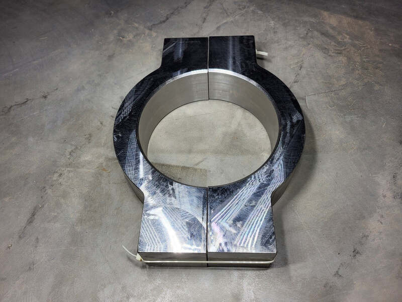 Caterpillar #462-9833, Single Tube Two Halves Saddle Clamp, 2.5" width, 7" inner diameter - Image 1