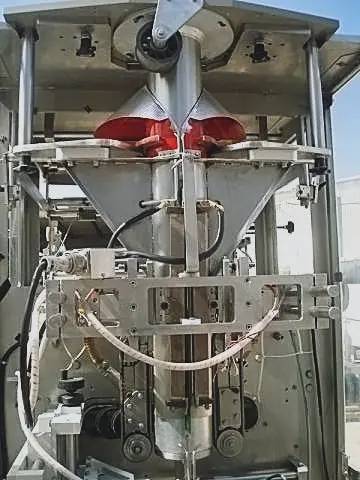Sandiacre Packaging Machinery Ltd. #TG400LX, single tube intermittent motion bag filler and sea, 6' 10" - Image 9