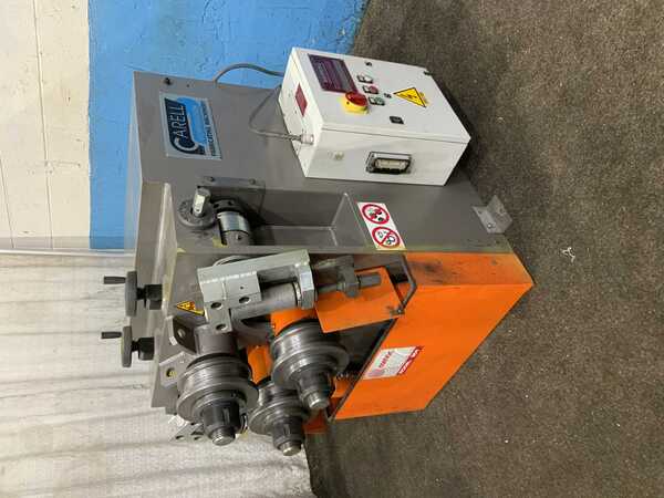 Comac #304HV, hydraulic angle rolls, leg-in/leg-out guides, 5 HP, 17 FPM, 2011 - Image 1